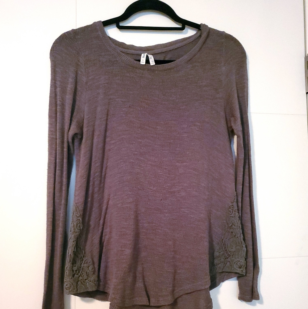 Green sweater with side detail